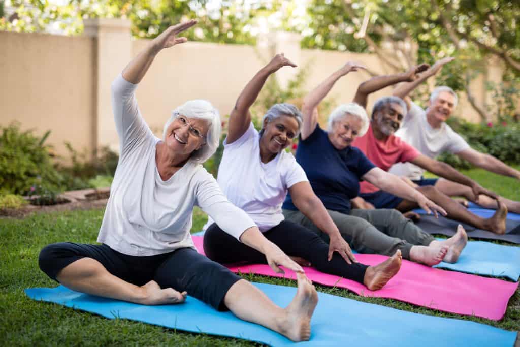 people doing yoga at a retirement community