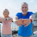 couple stretching to improve vitality